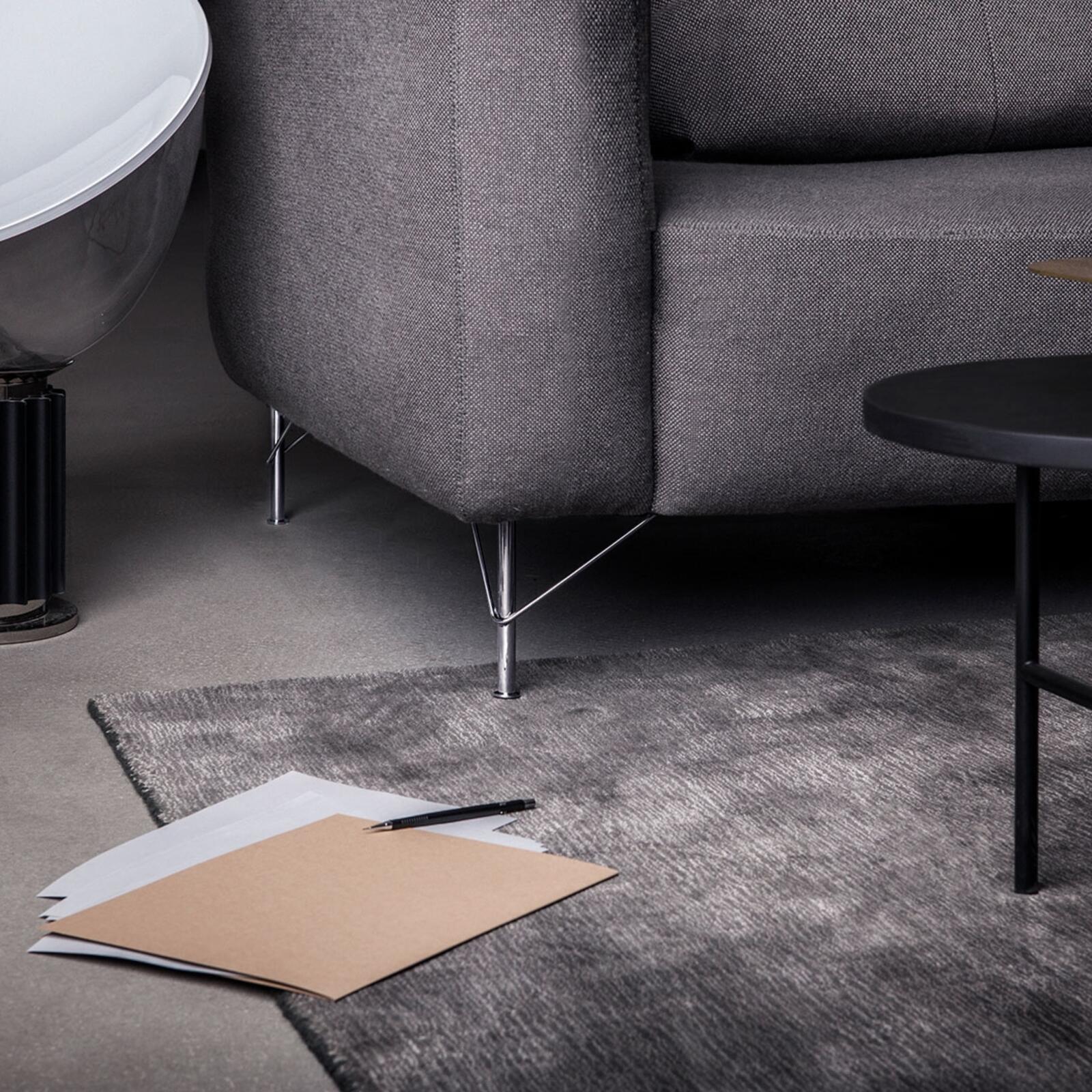 Uncluttered sofa legs in shiny metal, designed by Superfront