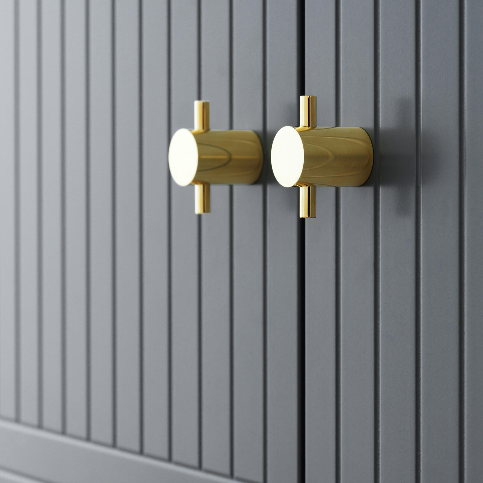 Handle in solid brass on grey, patterned fronts from Superfront